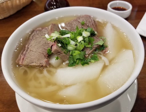 beef brisket and noodles in clear broth